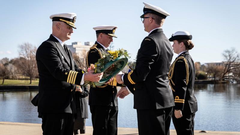 Commander Will Ashley Commanding Officer USS Canberra Blue Crew and Chief of Navy Australia Vice Admiral Mark Hammond AO, lay a wreath at the HMAS Canberra Navy Memorial.